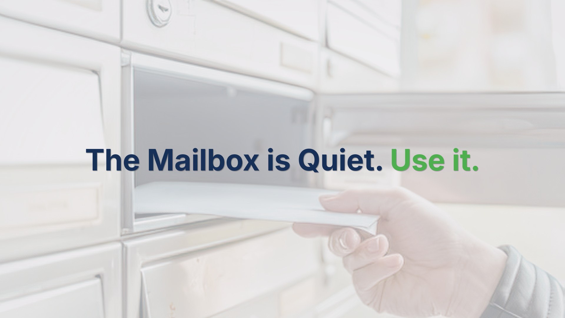 An image of mail being put into a mailbox.